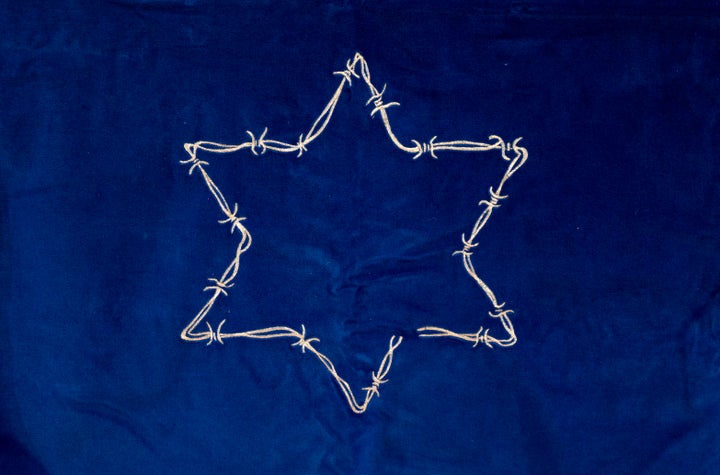 Una estrella de seis puntas, en el acto de recuerdo a las víctimas del Holocausto celebrado el 26 de enero en Madrid.