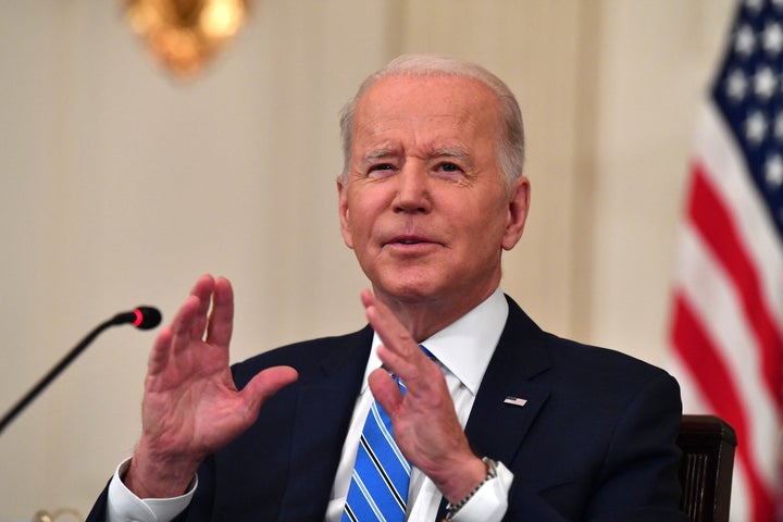 President Joe Biden speaks during a meeting with private sector CEOs in the State Dining Room of the White House in Washington, DC, on January 26, 2022. (Photo by NICHOLAS KAMM/AFP via Getty Images)