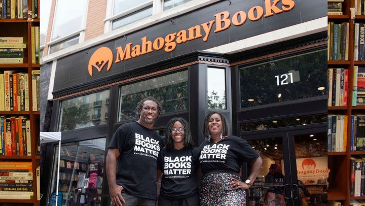 Derrick and Ramunda Young (above, with their daughter) began Washington, D.C.'s Mahogany Books in 2007 in an effort to empower others by providing access to vital Black literature.