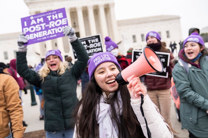 Demonstrators walk on First Street in Washington during the annual 49th March for Life anti-abortion demonstration ahead of a 2022 ruling that could overturn Roe v. Wade.