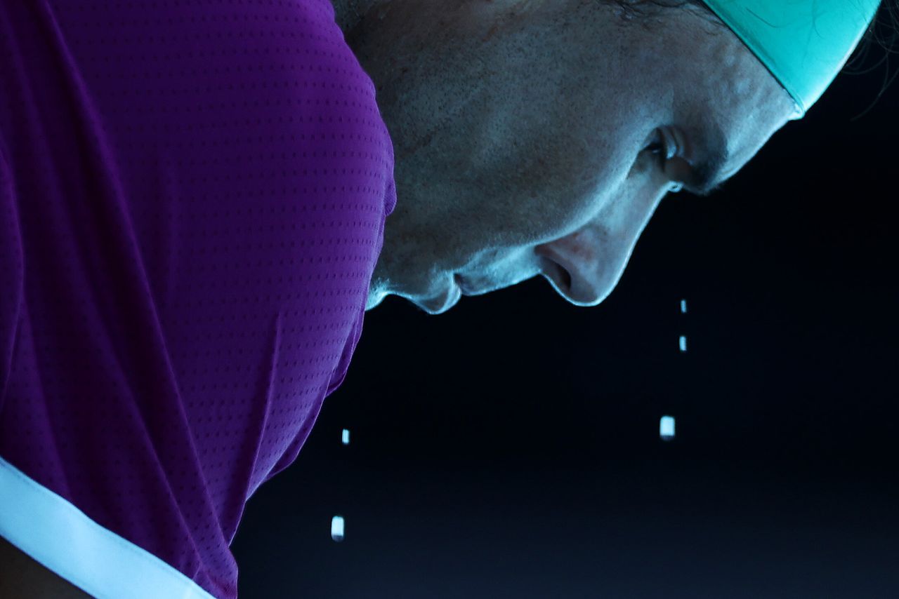 Sweat drips from Rafael Nadal during his Men's Singles Quarterfinals match against Denis Shapovalov at the 2022 Australian Open on Tuesday.