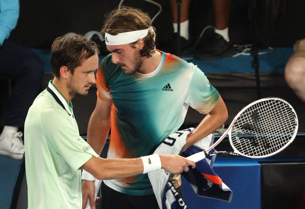 Tennis - Australian Open - Melbourne Park, Melbourne, Australia - January 28, 2022 Greece's Stefanos Tsitsipas and Russia's Daniil Medvedev during their semi final match REUTERS/Loren Elliott