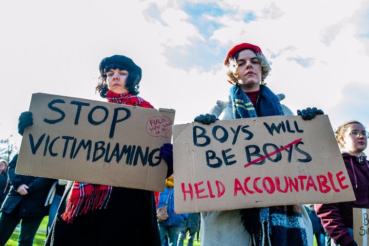 People are holding placards against sexual violence, during a demonstration against sexual violence after 'The Voice of Holland' scandal, organized in Amsterdam, on January 29th, 2022.