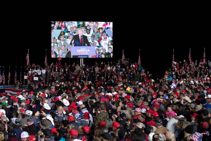 Former President Donald Trump is seen on a screen as he addresses a "Save America" rally in Conroe, Texas, on Jan. 29.