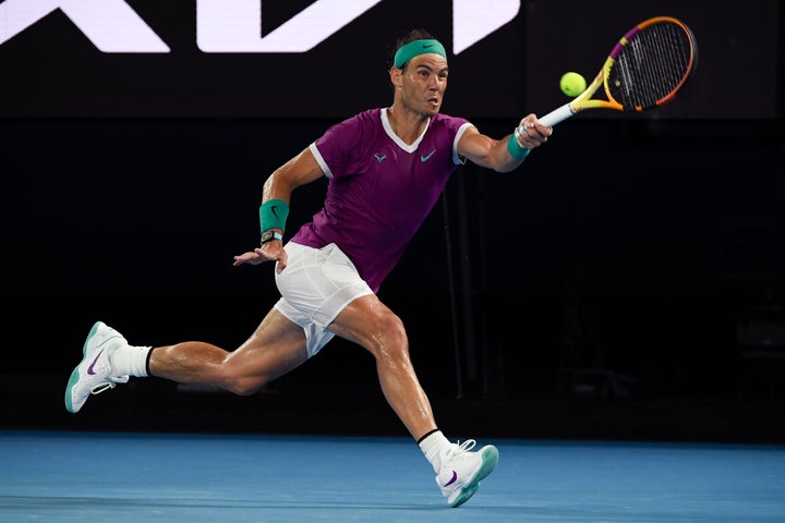 Rafael Nadal Wins Australian Open For Record 21st Major
Title 2 Rafael Nadal of Spain plays a forehand return to Daniil Medvedev of Russia during the men's singles final at the Australian Open tennis championships in Melbourne, Australia, Sunday, Jan. 30, 2022. (AP Photo/Andy Brownbill)