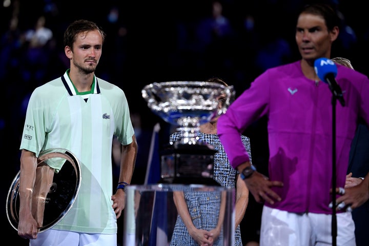 Rafael Nadal Wins Australian Open For Record 21st Major
Title 3 Daniil Medvedev, left, of Russia reacts after losing to Rafael Nadal of Spain in the men's singles final at the Australian Open tennis championships in Melbourne, Australia, early Monday, Jan. 31, 2022. (AP Photo/Andy Brownbill)