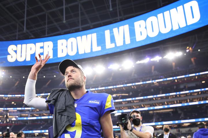 Matthew Stafford waves to the crowd after leading the Rams to victory over the 49ers, winning a berth in the Super Bowl.