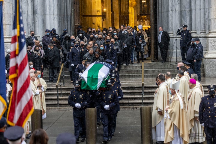 Police carry the casket of New York City Police Officer Jason Rivera out of St. Patrick's Cathedral after his funeral service.