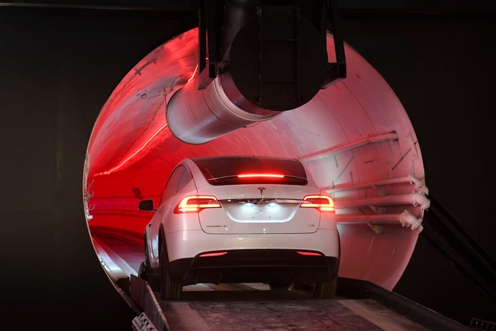 HAWTHORNE, CA - A modified Tesla Model X drives into the tunnel entrance before an unveiling event for The Boring Company Hawthorne test tunnel December 18, 2018. (Photo by Robyn Beck-Pool/Getty Images)