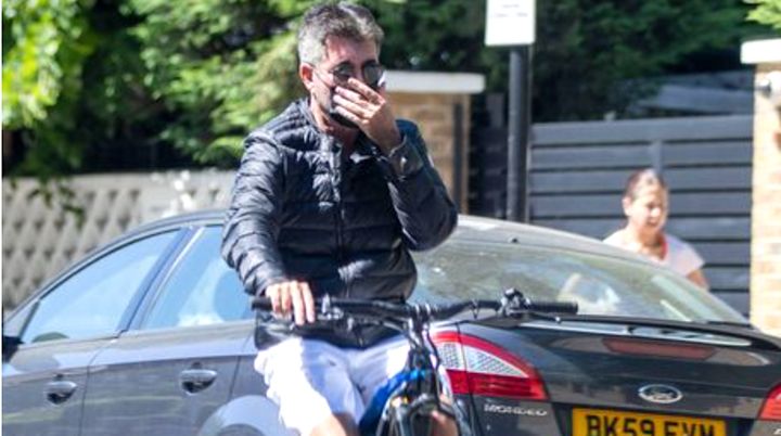 Simon Cowell, pictured on a bike last June in London, suffered a nasty spill in another bike accident.