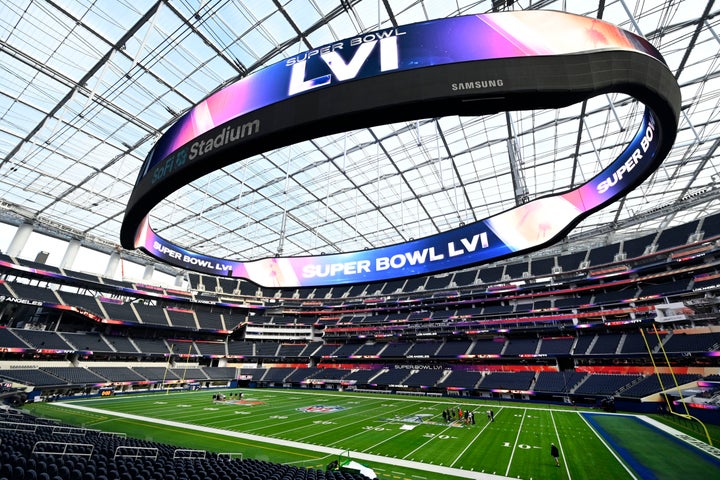 Crews work on field preparation for Super Bowl LVI at Sofi Stadium in Inglewood.