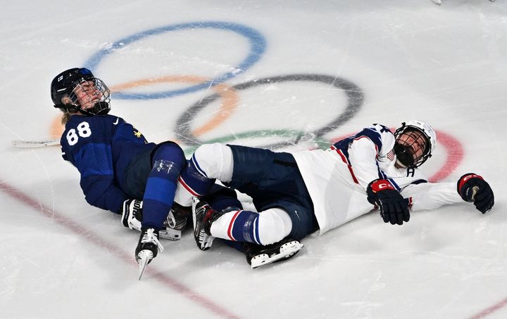 Brianna Decker, left, is out of the Olympics after this collision with Finland's Ronja Savolainen. 