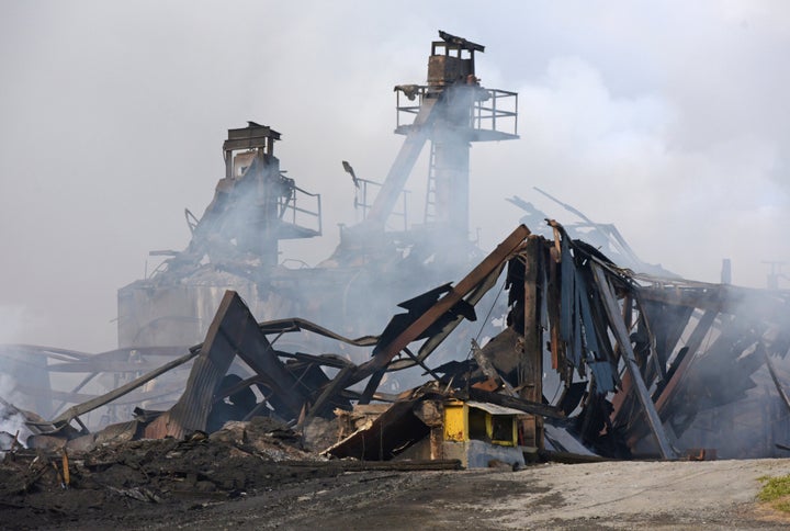 North Carolina's Winston Weaver Company fertilizer plant is seen smoldering on Wednesday.