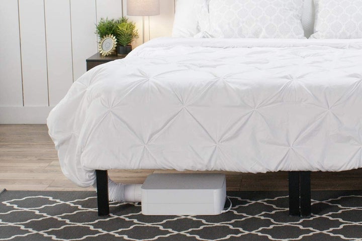 Handy gadgets like the <a href="https://www.amazon.com/BedJet-Cooling-Heating-Climate-Control/dp/B01BMCWJ7G?tag=kristenadaway-20&ascsubtag=61fc7930e4b05004242ab3c8,-1,-1,d,0,0,hp-fil-am=0" target="_blank" role="link" data-amazon-link="true" rel="sponsored" class=" js-entry-link cet-external-link" data-vars-item-name="BedJet" data-vars-item-type="text" data-vars-unit-name="61fc7930e4b05004242ab3c8" data-vars-unit-type="buzz_body" data-vars-target-content-id="https://www.amazon.com/BedJet-Cooling-Heating-Climate-Control/dp/B01BMCWJ7G?tag=kristenadaway-20&ascsubtag=61fc7930e4b05004242ab3c8,-1,-1,d,0,0,hp-fil-am=0" data-vars-target-content-type="url" data-vars-type="web_external_link" data-vars-subunit-name="article_body" data-vars-subunit-type="component" data-vars-position-in-subunit="0">BedJet</a> keep you warm and cozy while you sleep, even on the draftiest days.