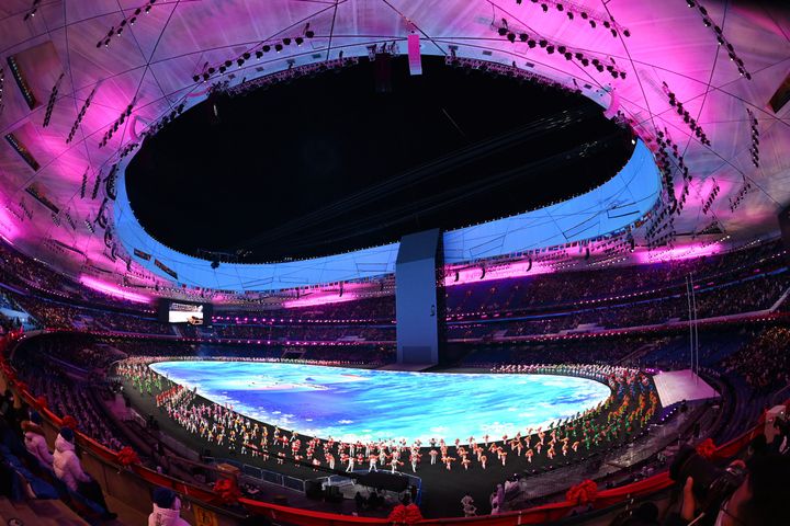 BEIJING, CHINA - FEBRUARY 04: General view inside the stadium as performers dance during the Opening Ceremony of the Beijing 2022 Winter Olympics at the Beijing National Stadium on February 04, 2022 in Beijing, China. (Photo by Matthias Hangst/Getty Images)