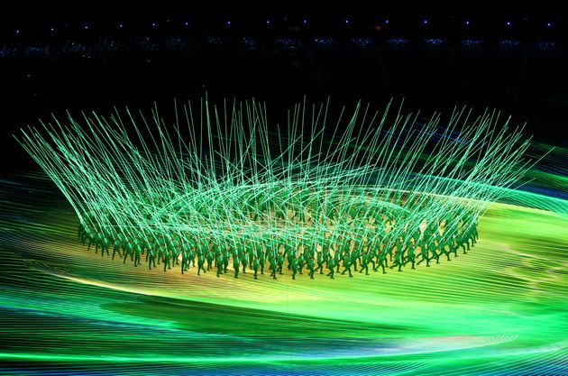 BEIJING, CHINA - FEBRUARY 04: Performers create a flower display with LED lights during the Opening Ceremony of the Beijing 2022 Winter Olympics at the Beijing National Stadium on February 04, 2022 in Beijing, China. (Photo by Adam Pretty/Getty Images)