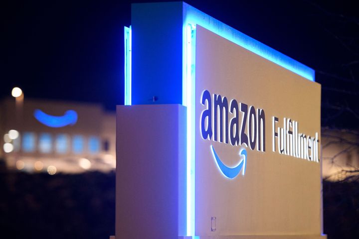 A sign at the Amazon fulfillment center is seen before sunrise on March 29, 2021, in Bessemer, Alabama.