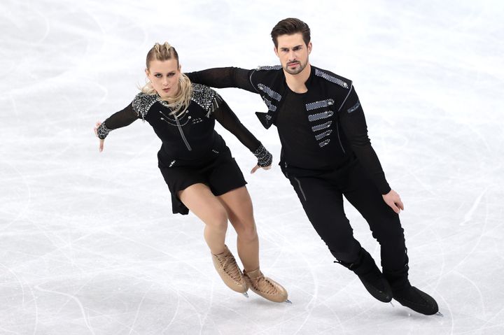 Madison Hubbell and Zachary Donohue of Team USA skate in the ice rhythm dance team event during the 2022 Winter Olympics on Friday.