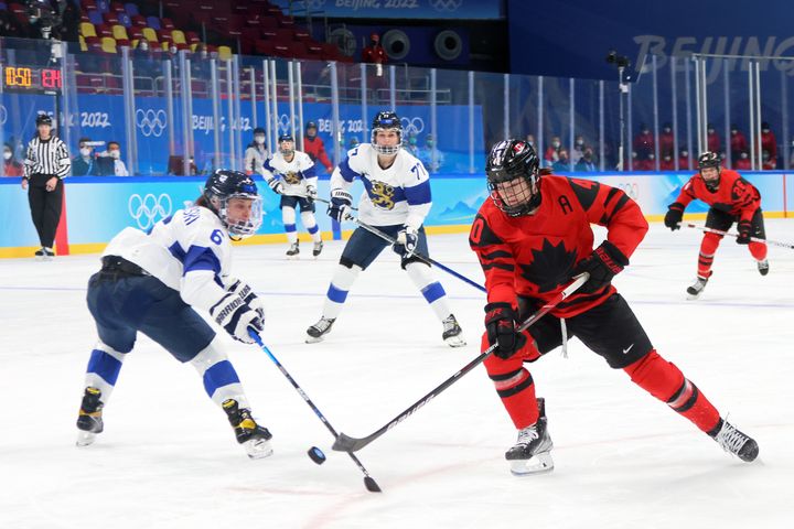 Blayre Turnbull helped Canada to an 11-1 rout over Finland on Saturday after reuniting with Ryan Sommer at the opening ceremony.