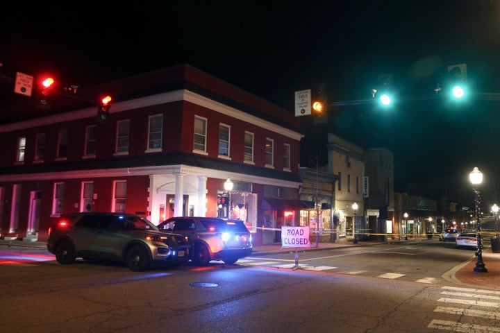 Officers conduct an investigation after a fatal shooting at the Melody Hookah Lounge. qhiukiuiqkeinv