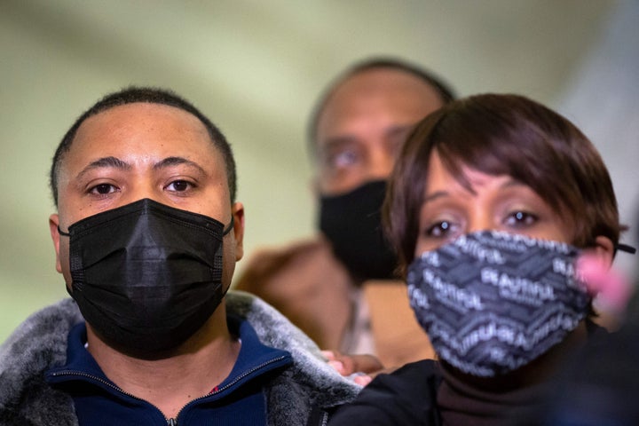Amir Locke's parents Andre Locke and Karen Wells look on during a press conference at City Hall in Minneapolis, Minnesota, on February 4, 2022. qhiukiuiqkeinv