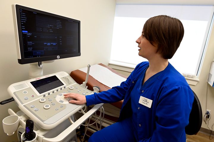 Nurse Cassie Owen demonstrates an ultrasound machine at the Portico Crisis Pregnancy Center. 