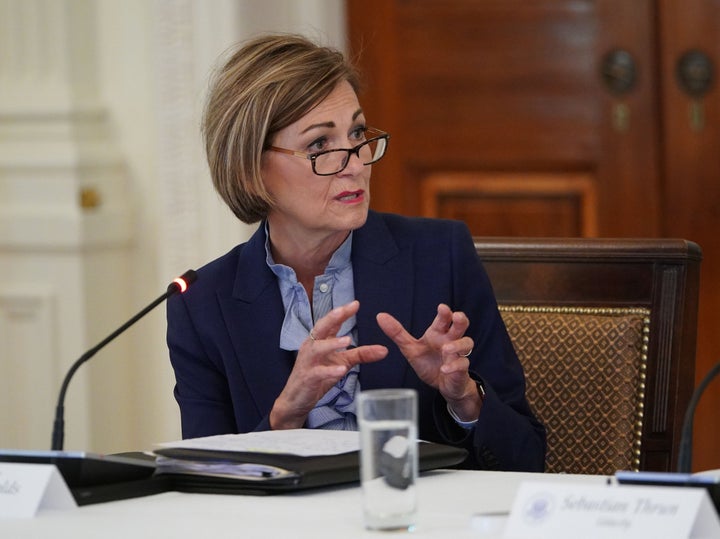 Iowa Gov. Kim Reynolds (R), seen here at a 2020 meeting, has said the state must act to address its child care crisis. Advocates worry the three bills her legislative allies are pushing will make the crisis worse.