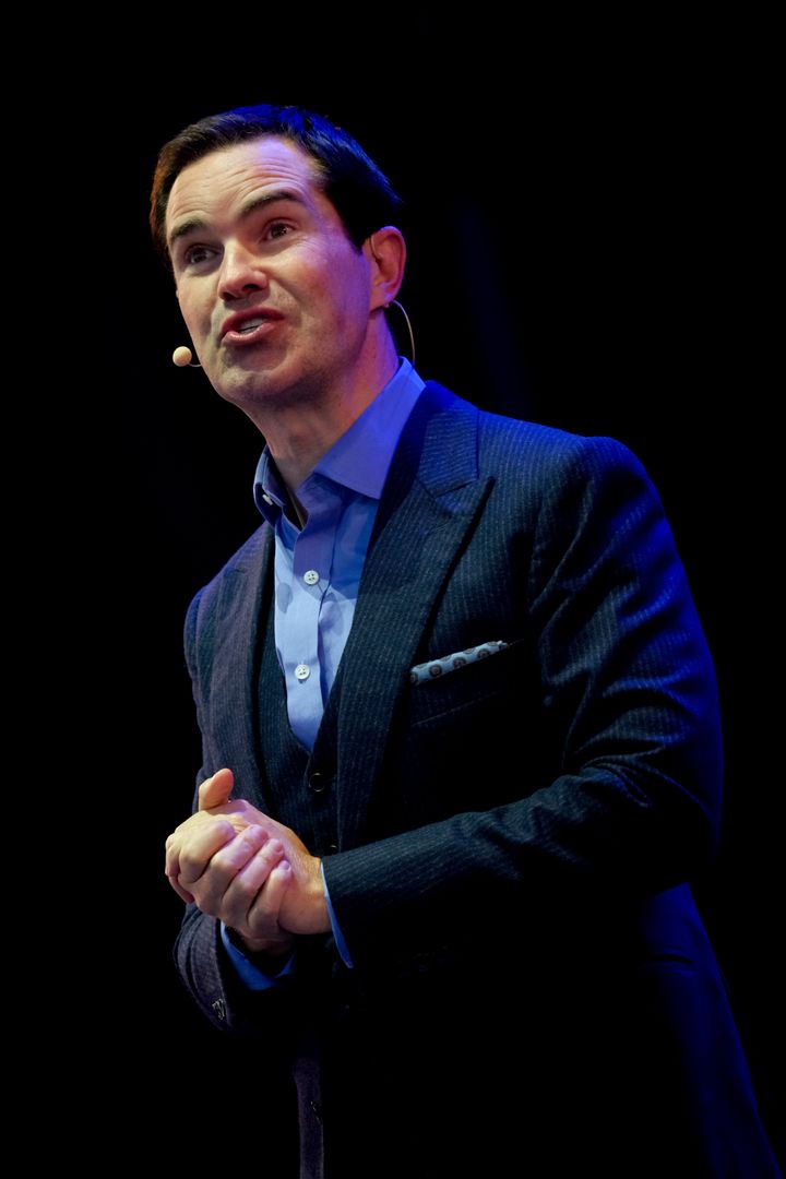 Jimmy Carr on stage.