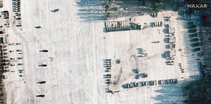 This satellite image shows multiple rocket launcher deployments near Yelsk, Belarus, on Friday. Russia has moved troops from Siberia and the Far East to Belarus for sweeping joint drills. The Russian troop deployment to Belarus raised concerns in the West that Moscow could stage an attack on Ukraine from the north.