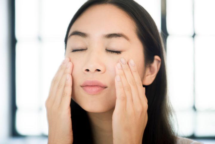 Face yoga — which consists of stretching, massaging and moving your face — can release tension. 