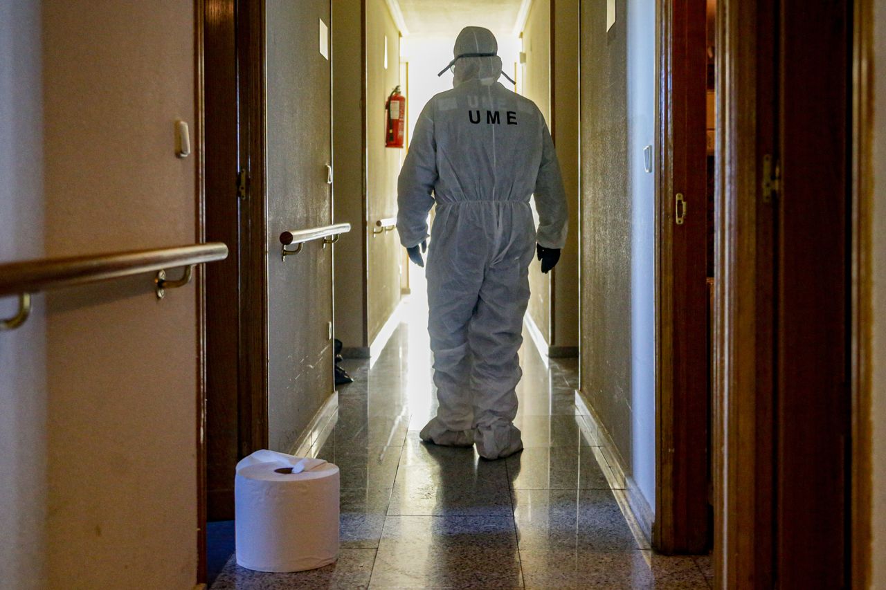A soldier disinfects a nursing home in the town of Villaviciosa de Odón on March 26, 2020.