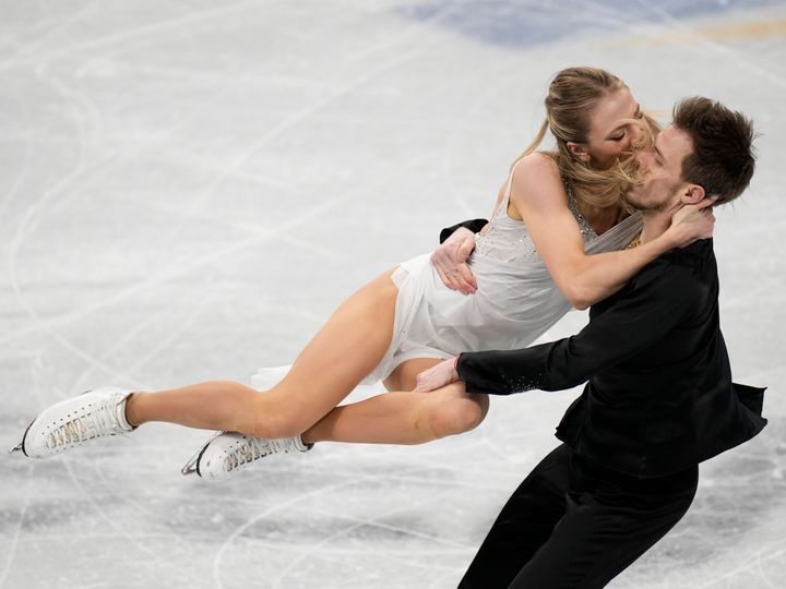 Victoria Sinitsina and Nikita Katsalapov, of the Russian Olympic Committee, compete in the team ice dance program during the figure skating competition at the 2022 Winter Olympics, Monday, Feb. 7, 2022, in Beijing. (AP Photo/Bernat Armangue)