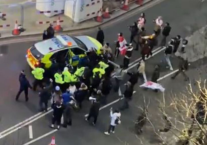 Keir Starmer was bundled into a police car following the incident