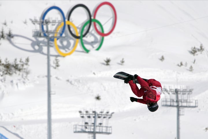 Max Parrot's victory run was a unique ride through the rails buffeted by ice-formed replicas of sections of the Great Wall.