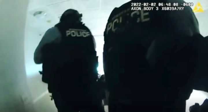 In this image taken from Minneapolis Police Department body camera video and released by the city of Minneapolis, Minneapolis police enter an apartment on Wednesday, Feb. 2, 2022 moments before shooting 22-year-old Amir Locke. (Minneapolis Police Department via AP)
