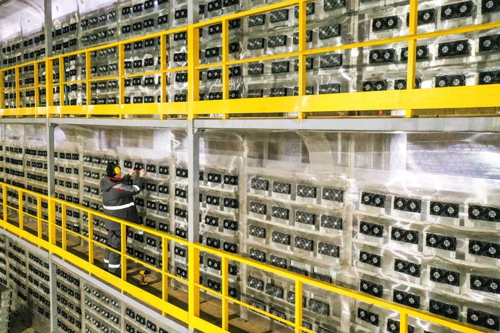 A solo engineer tends to a large cryptocurrency mining operation in Russia.
