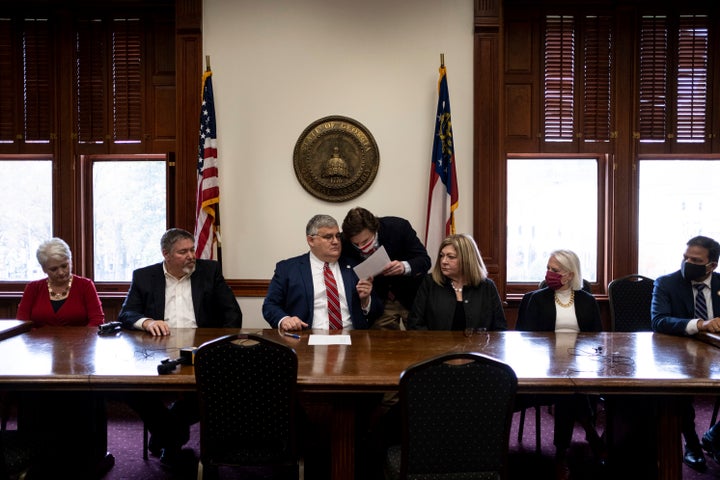 A slate of fake "electors" nominated by the Republican Party of Georgia cast their own electoral votes for Donald Trump at the Georgia state Capitol on Dec. 14, 2020, at the same time the official Democratic electors were casting their votes for Joe Biden in another part of the Capitol.