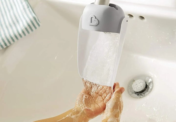This <a href="https://www.amazon.com/dp/B07MB5PTNG?tag=kristenadaway-20&ascsubtag=620426ece4b0e224afc204a4,-1,-1,d,0,0,hp-fil-am=0" target="_blank" role="link" data-amazon-link="true" rel="sponsored" class=" js-entry-link cet-external-link" data-vars-item-name="faucet extender" data-vars-item-type="text" data-vars-unit-name="620426ece4b0e224afc204a4" data-vars-unit-type="buzz_body" data-vars-target-content-id="https://www.amazon.com/dp/B07MB5PTNG?tag=kristenadaway-20&ascsubtag=620426ece4b0e224afc204a4,-1,-1,d,0,0,hp-fil-am=0" data-vars-target-content-type="url" data-vars-type="web_external_link" data-vars-subunit-name="article_body" data-vars-subunit-type="component" data-vars-position-in-subunit="0">faucet extender</a> helps your little ones wash their hands with little assistance.