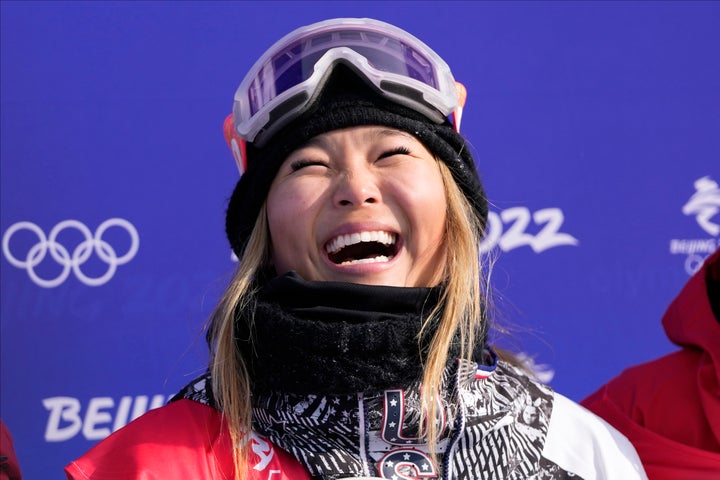 Gold medal winner United States' Chloe Kim celebrates after the women's halfpipe finals at the 2022 Winter Olympics.