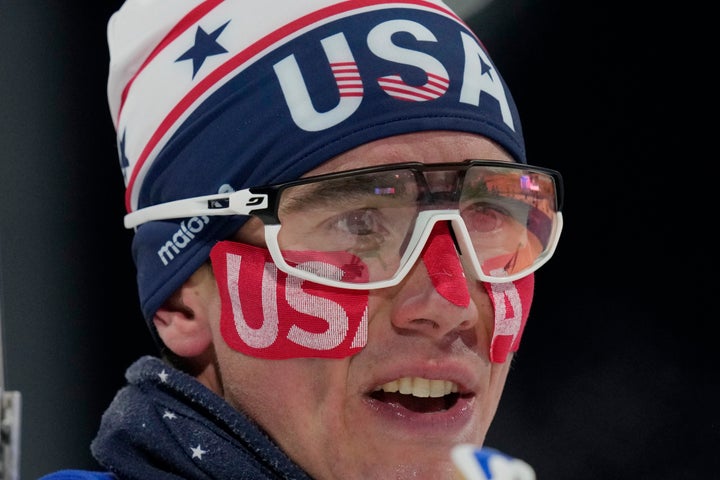 Jake Brown of the U.S. watches after crossing the finish line during the men's 20-kilometer individual race.