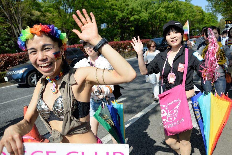 People participating in the Tokyo Rainbow Pride parade in Harajuku on April 25, 2015.