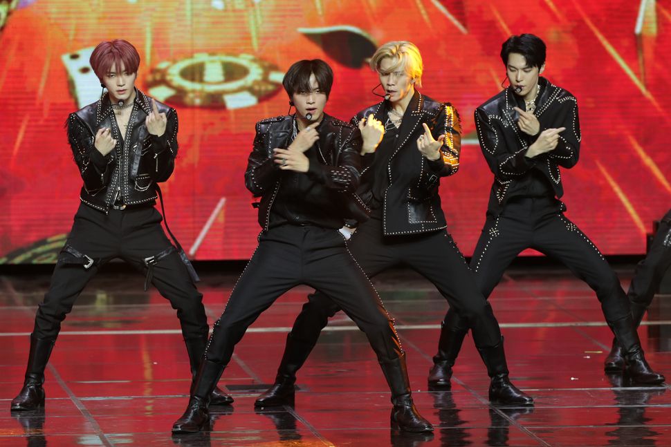 Members of the band NCT 127 perform during the 11th Gaon Chart Music Awards at Jamsil Indoor Gymnasium on Jan. 27 in Seoul, South Korea.