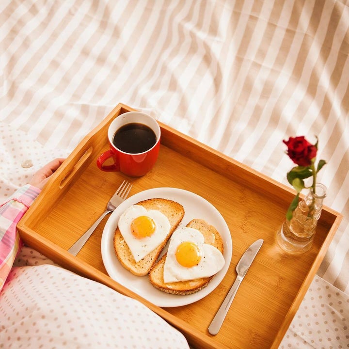 Fried egg hearts, bacon, avocado and sriracha toast