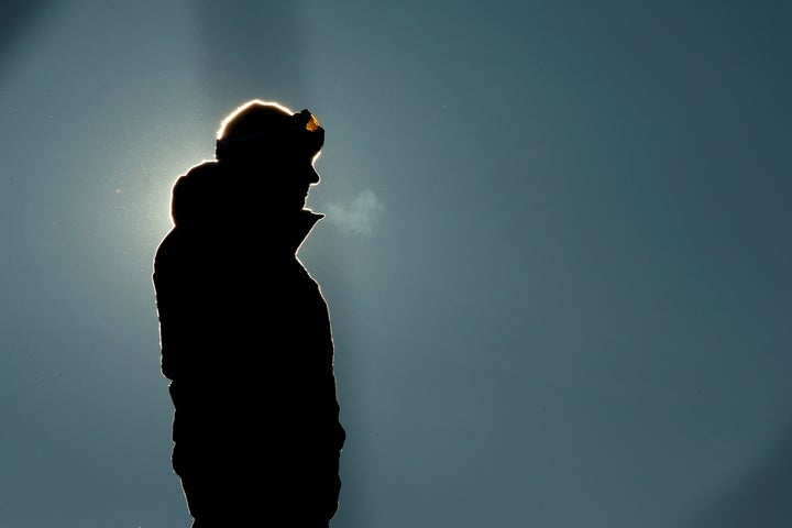 U.S. snowboard coach Peter Foley looks on in the men's slopestyle qualification during the 2014 Winter Olympics in Sochi, Russia. qhiukiuiqkeinv