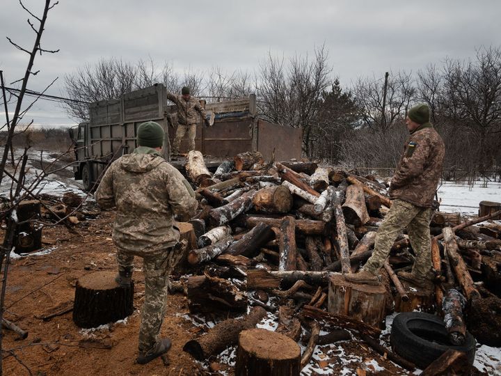 With no fuel and little electricity, Ukrainian soldiers store wood for the duration of the winter on February 9, 2022 in Pisky, Ukraine.