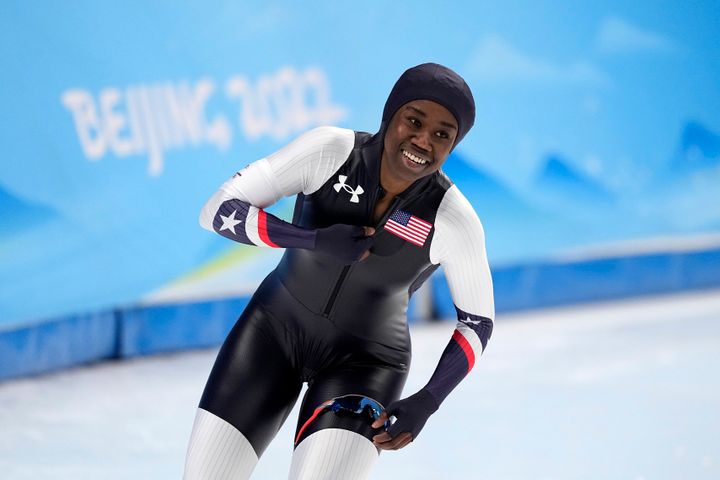 Erin Jackson of the United States reacts after her heat in the speedskating women's 500-meter race at the 2022 Winter Olympics, Sunday, Feb. 13, 2022, in Beijing. (AP Photo/Sue Ogrocki)
