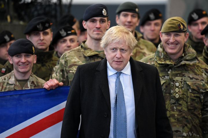 Boris Johnson with British troops during a visit to Warszawska Brygada Pancerna military base near Warsaw, Poland, last week.