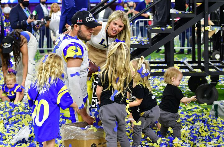 Matthew Stafford and wife Kelly celebrate with their family after the big game.