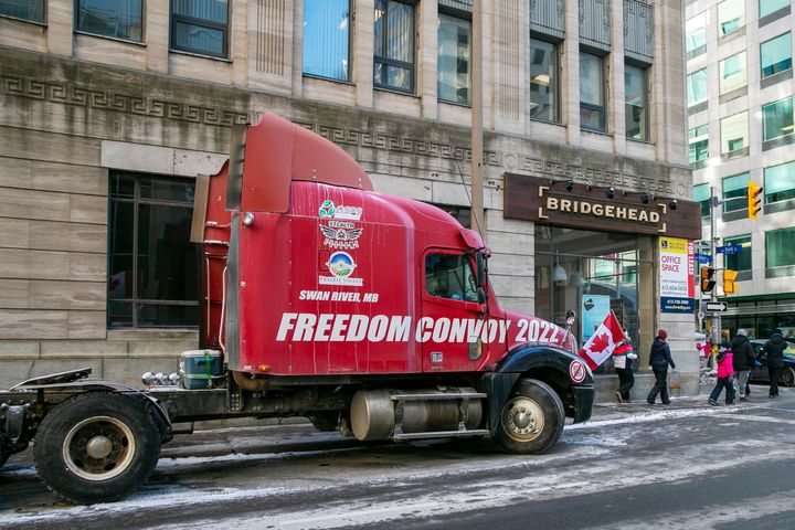 The words "Freedom Convoy 2022" are visible on a truck that is part of a demonstration against COVID-19 restrictions in Ottawa, Ontario, Canada, on Sunday, Feb. 13, 2022. (AP Photo/Ted Shaffrey)