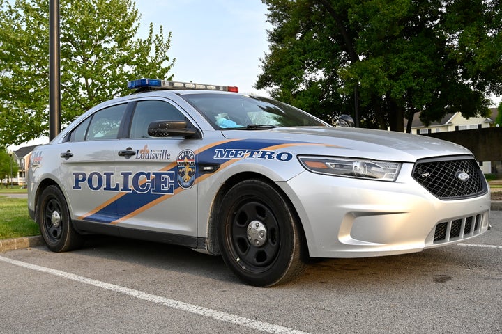 A Louisville Metro Police cruiser sits outside the Second District station in Louisville, Kentucky, April 27, 2021.